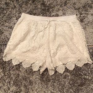 White lace shorts